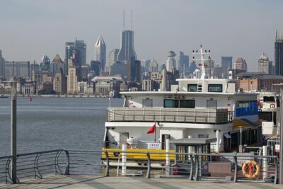 4-Hr Shanghai Tour: Food, Culture, Sightseeing, Cycling, Ferry - Huangpu River ferry ride: nostalgia with cranes in the frame