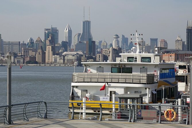 4-Hr Shanghai Tour: Food, Culture, Sightseeing, Cycling, Ferry - Huangpu River ferry ride: nostalgia with cranes in the frame
