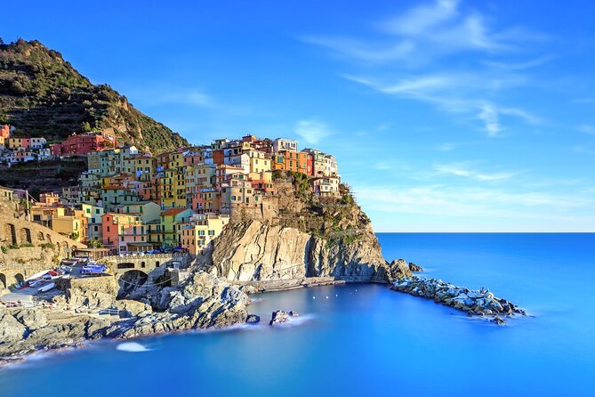Cinque Terre Private Tour by Minivan and Ferry-Boat from Pisa - Riomaggiore: catching the coastline from the water or the rails