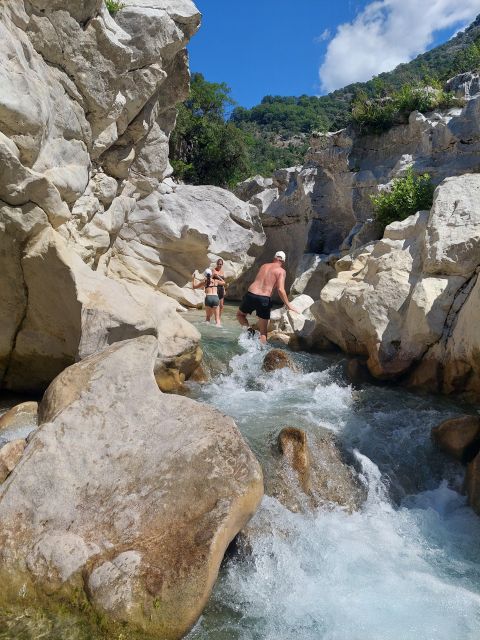 Corfu: Acheron River Trekking Tour with Ferry Trip - Entering the Acheron River: trekking that turns into swimming