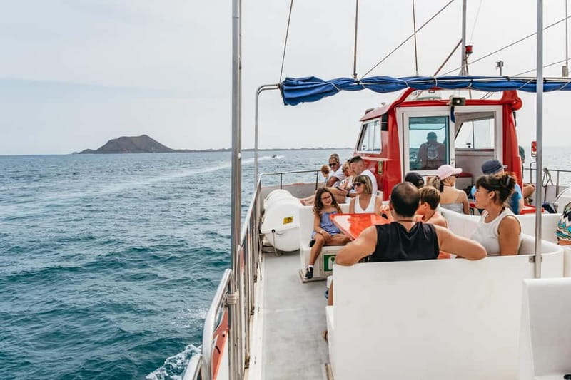 Desde Corralejo: Lobos Island Ferry with Optional Transfer - Your Day on Lobos Island: Volcanic Trails, Snorkel Time, and the Lighthouse Option