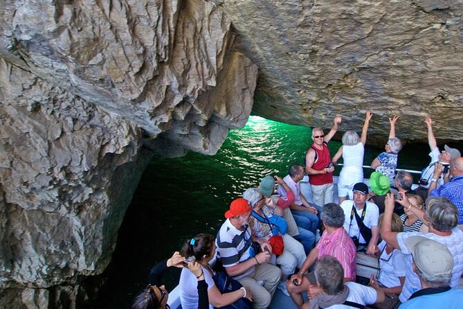 Full Day Capri Tour from Pompeii by Small Ferry Boat - Capri by boat: Faraglioni, Marina Piccola, and the grottos tour