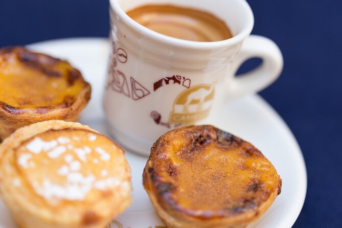 Lisbon Hidden Gems Walk: Traditions, Lunch and Ferry ride - Coffee and pastel de nata in an off-the-crowd bakery