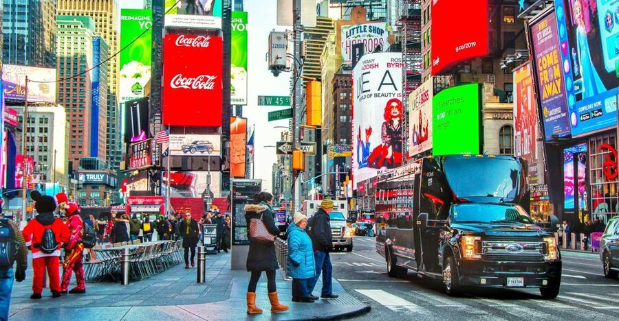 NYC: Guided Bus and Walking Tour with Staten Island Ferry - Midtown highlights: Times Square to Central Park’s zero-mile moment