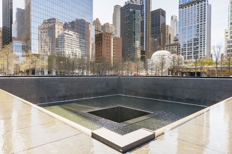 NYC: Wall Street Tour with 9/11 Memorial and Statue Ferry - Meet at 24 Broad Street: start with the right kind of focus