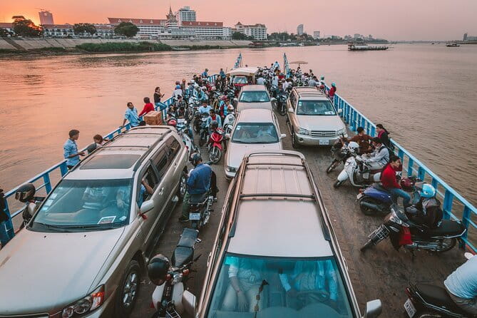 Riverside Walking Tour with Snack, Drinks & Local Ferry Ride - A $7 Phnom Penh sunset walk: ferry, palace views, and Wat Botom Park