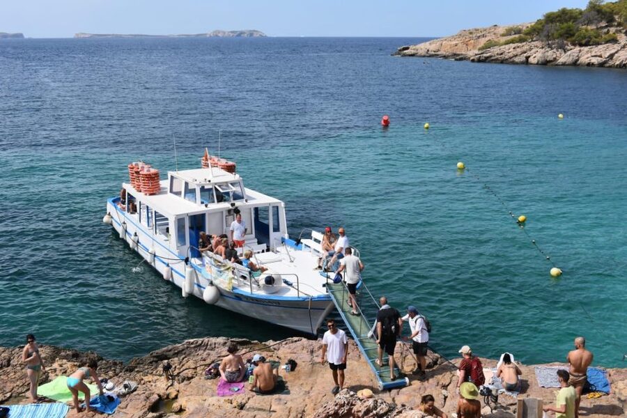 Sant Antoni: Round-Trip Ferry Transfer to Cala Salada Beach - Cala Saladeta: the short walk that’s worth it (but bring sneakers)