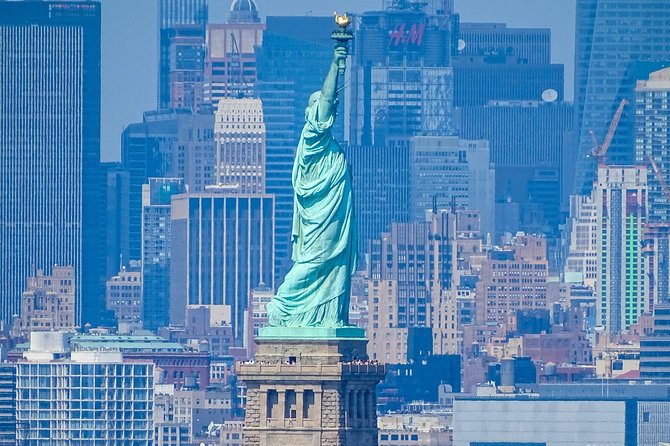 Statue of Liberty Ellis Island Ferry Ticket with Upgrade Options - Liberty Island: photos, audio headsets, or a live guide in English