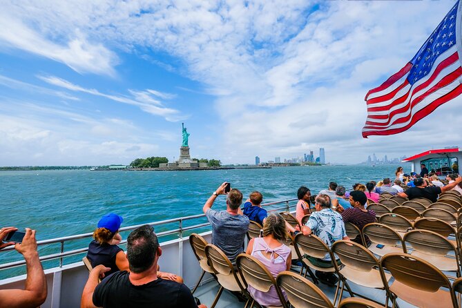 Statue of Liberty & Ellis Island Guided Tour with Ferry Transfers - Ellis Island Immigration Museum: Great Hall time plus ancestry research tools