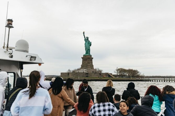 Statue of Liberty Ferry Boat Pass - Stop 1: Pier 36 NYC boarding and first views of Liberty Island
