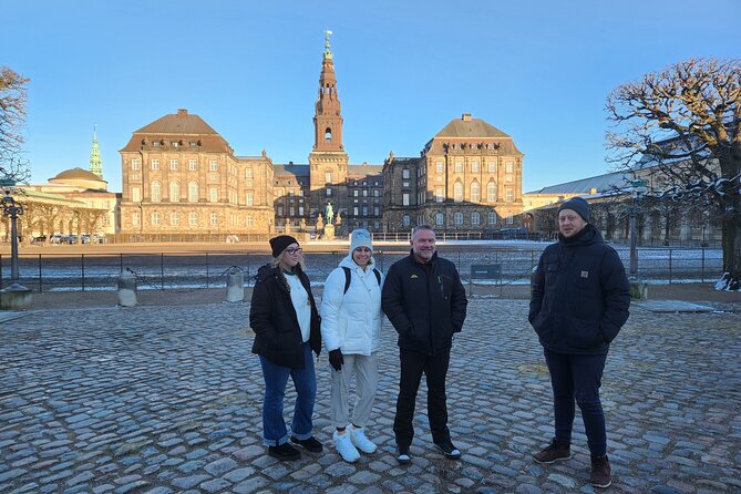 Walk & Canal Tour: Copenhagen Highlights + Changing of the Guards - Electric harbor ferry: waterfront views plus the Børsen dragon spire